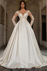 A Line Long Sleeve White Wedding Dress Beaded Lace Up Lace Ball Gown Bridal Gown With Pearls