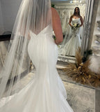 Elegant Sleeveless Mermaid Satin Bridal Dress with Ruffles