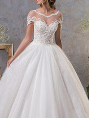 Sexy A-Line Wedding Dresses Jewel Lace Tulle Short Sleeve Bridal Gowns Vintage See-Through Backless Court Train