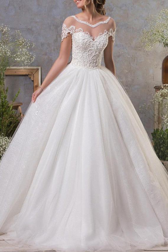 Sexy A-Line Wedding Dresses Jewel Lace Tulle Short Sleeve Bridal Gowns Vintage See-Through Backless Court Train