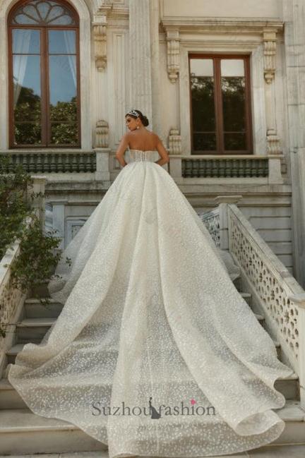Strapless Sleeveless Beaded Ball Gown Lace Up Cathedral Train Bridal Gown With Appliques